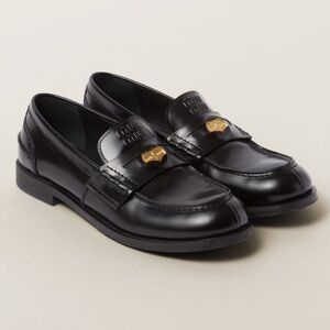 Miu Miu Brushed Leather Penny Loafers in Black
